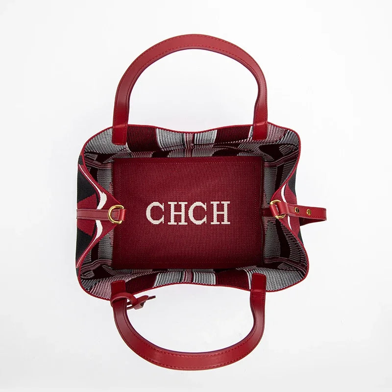 حقيبة توت فاخرة من Carolina Herrera بنقشة CH هندسية – تصميم أنيق وعملي